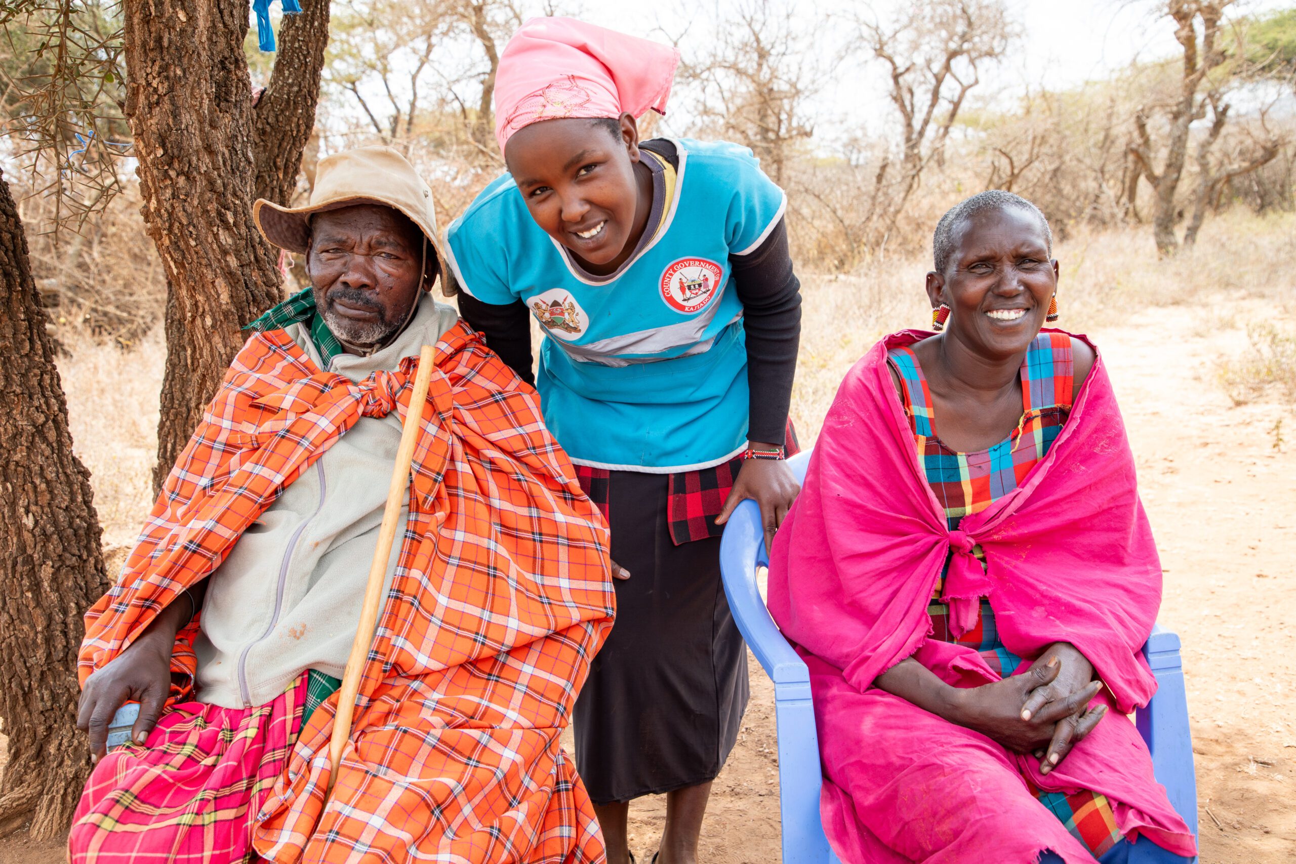 From left Mr Lesalon Naikuni, Tutayo Parkironka, a Community Health Promoter (middle) and Mrs Roda Lesalon at home in Odekesi Village, Kajiado County-Kenya